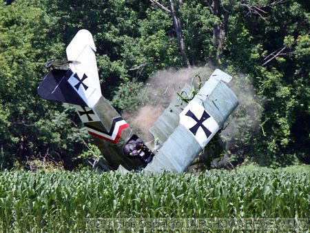 A vintage replica Fokker DR-1 Triplane crashed at Geneseo, the pilot walked away!
